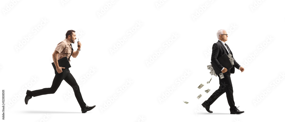 Full length profile shot of a security guard chasing a businessman with a suitcase full of money