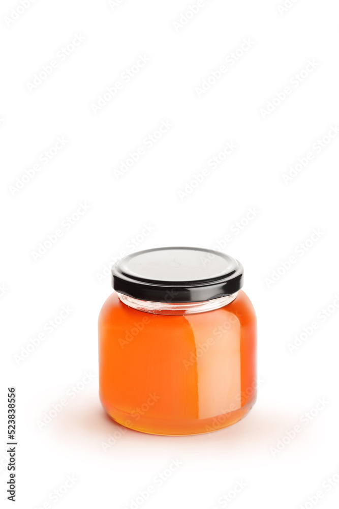 Studio shot of a small honey jar Studio shot of a small honey jar