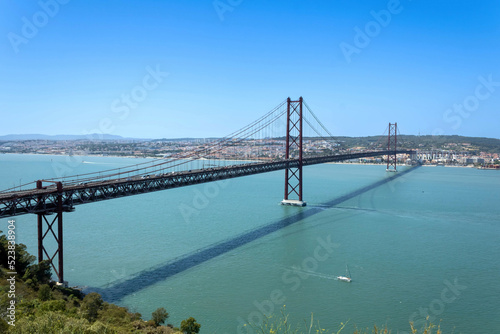 An aerial view of the 25 de Abril Bridge (Portuguese: Ponte 25 de Abril) across the Tagus river