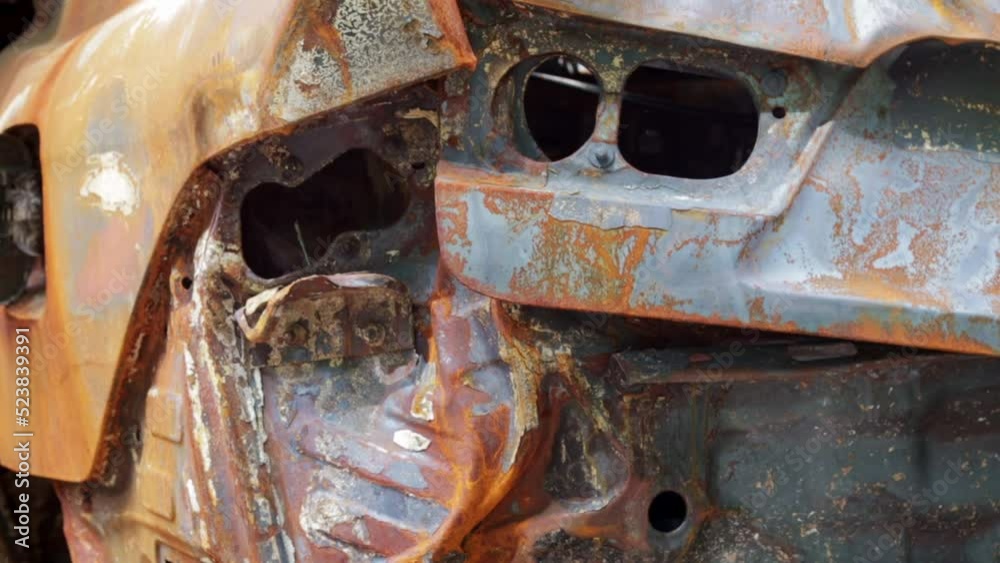 The car was completely destroyed by fire. Abandoned, burnt and rusty ...