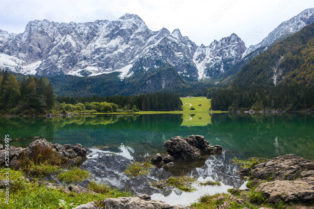 Upper Fusine Alpine Lake in Julian Alps with Mount Mangart in Upper Center of the Photograph