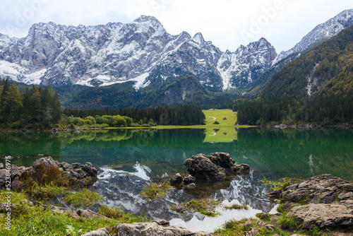 Upper Fusine Alpine Lake in Julian Alps with Mount Mangart in Upper Center of the Photograph
