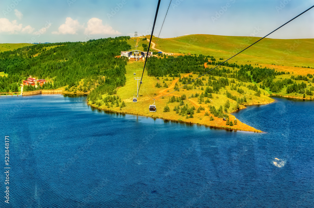Gold Gondola in operations during summer day at Zlatibor, Serbia.