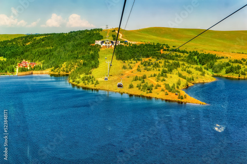 Obraz na płótnie Gold Gondola in operations during summer day at Zlatibor, Serbia. w salonie