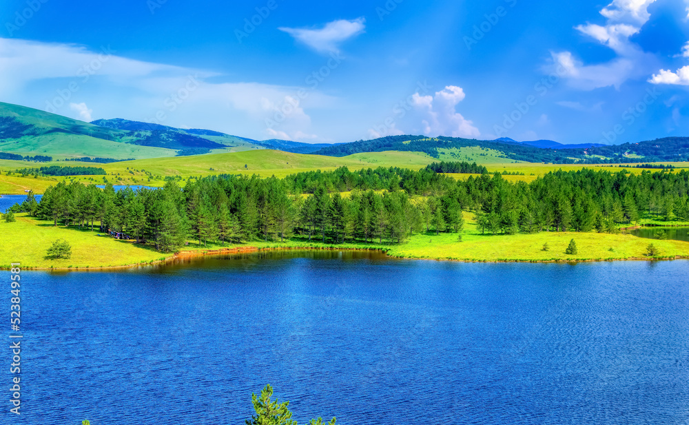 Aerial view over mountain lake at Zlatibor, Serbia. Aerial view over mountain lake at Zlatibor, Serbia.