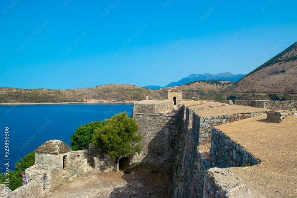 Walls of an old fortress Ali Pasha Tepelena Fortress Porto Palermo near Himare city located on a peninsula in the bay of the Ionian Sea. Albania