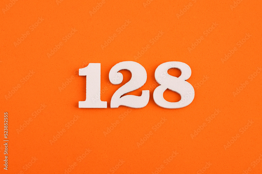 Number 128 - On orange foam rubber background