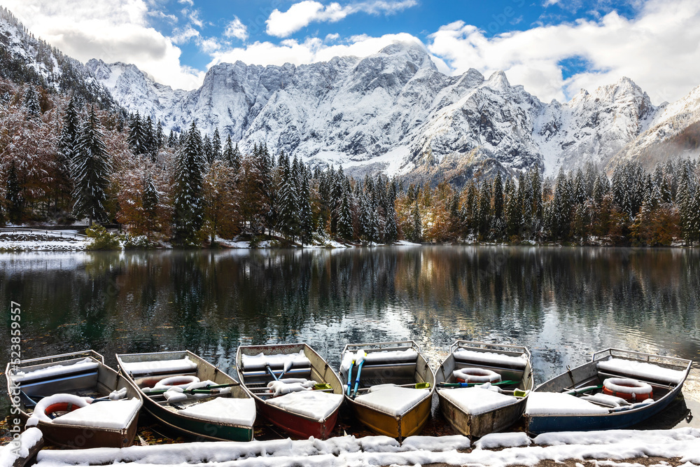 Winter Panorama of Lower Fusine Alpine Lake in Julian Alps with Mount Mangart in Upper Center of the Photograph