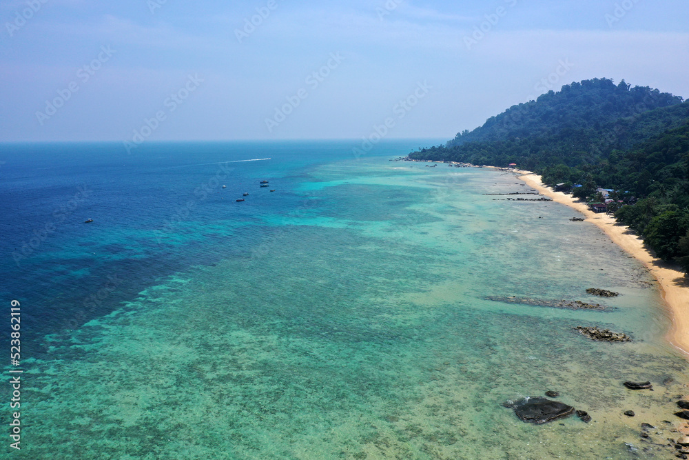 Tioman tropical island drone photo with beautiful blue sea and sky. South china sea Southeast Asia.