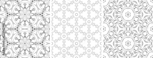 Set of kaleidoscope seamless patterns in black and white. Hand drawn vector illustration.