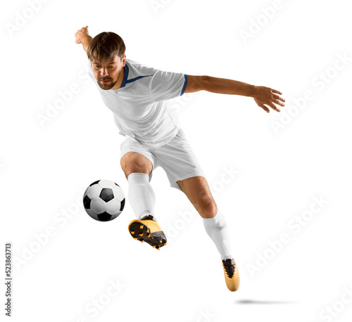 Soccer player in action on white background