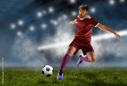 Soccer player in action © Andrey Burmakin