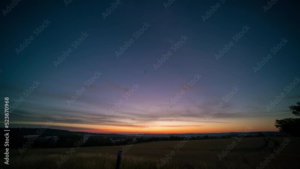 timelapse of sunrise dawn on a summer field timelapse of sunrise dawn on a summer field
