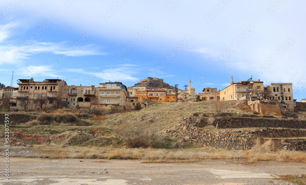 Cityscape and Nevshehirskaya Fortress Kayasehir in Nevsehir city, Cappadocia, Turkey