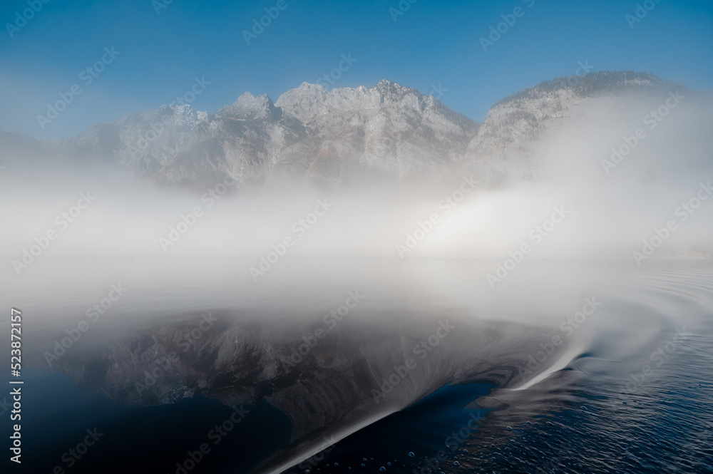 Morning winter fog over lake Konigsee in Berchtesgaden