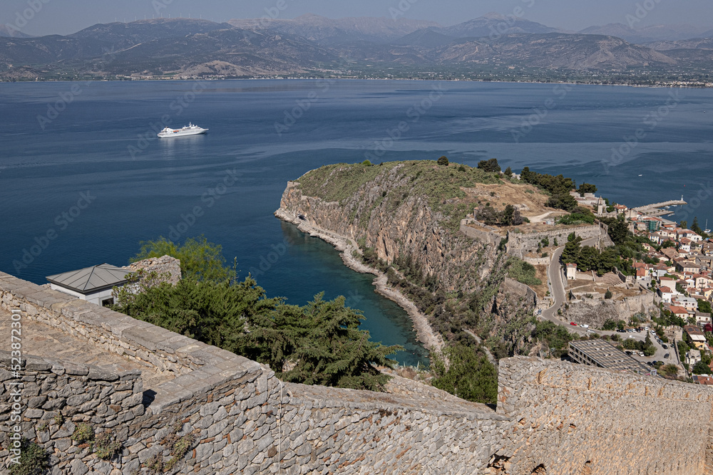 The Castle of Palamidi, the best well-maintained huge castle, the Venetian fortifications architectural masterpice, located in Nafplio on the crest of a 216m cliff, Argolis, Peloponnese, Greece The Castle of Palamidi, the best well-maintained huge castle, the Venetian fortifications architectural masterpice, located in Nafplio on the crest of a 216m cliff, Argolis, Peloponnese, Greece