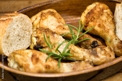 crispy chicken drumsticks with rosemary photo