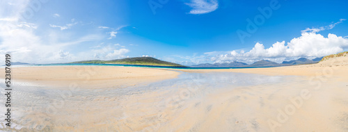Wide panoramic view of Luskentyre Sands beach on the Isle of Harris, Scotland, UK