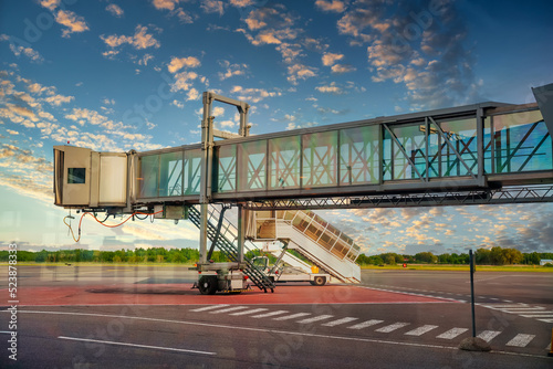 Jet bridge from an airport terminal gate. photo