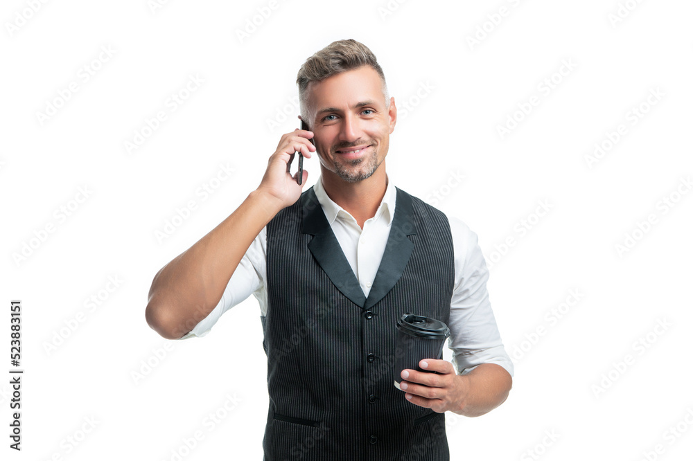 Happy manager talking on mobile phone during coffee break isolated on white Happy manager talking on mobile phone during coffee break isolated on white