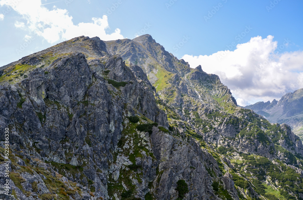 Picturesque scenery view of rocky mountains on the trail towards Slavkovsky stit peak. High Tatras nature on Slovakia 