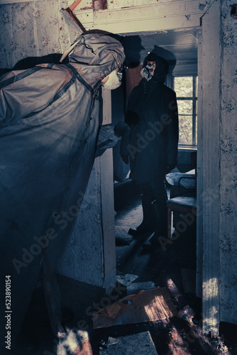 Fictional movie poster. People with flashlights, masks and protective clothing inspect old house. Infected epidemic people in destroyed home. Dark gloomy environment, filter processing. 