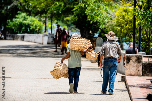 two friends walking at mompox street