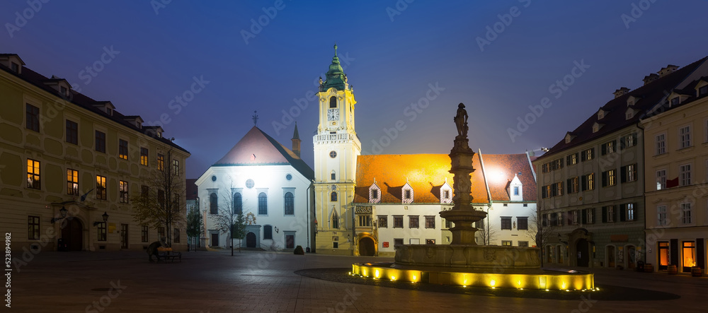 Night view of buildings and fountain on Main Square in Bratislava historic city center