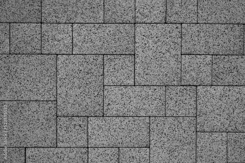 gray background,in the photo decorative finishing tiles for the sidewalk gray background,in the photo decorative finishing tiles for the sidewalk