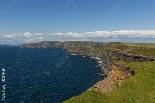Beautiful Cliffs of Moher in County Clare, Ireland - Aillte an Mhothair in Irish photo