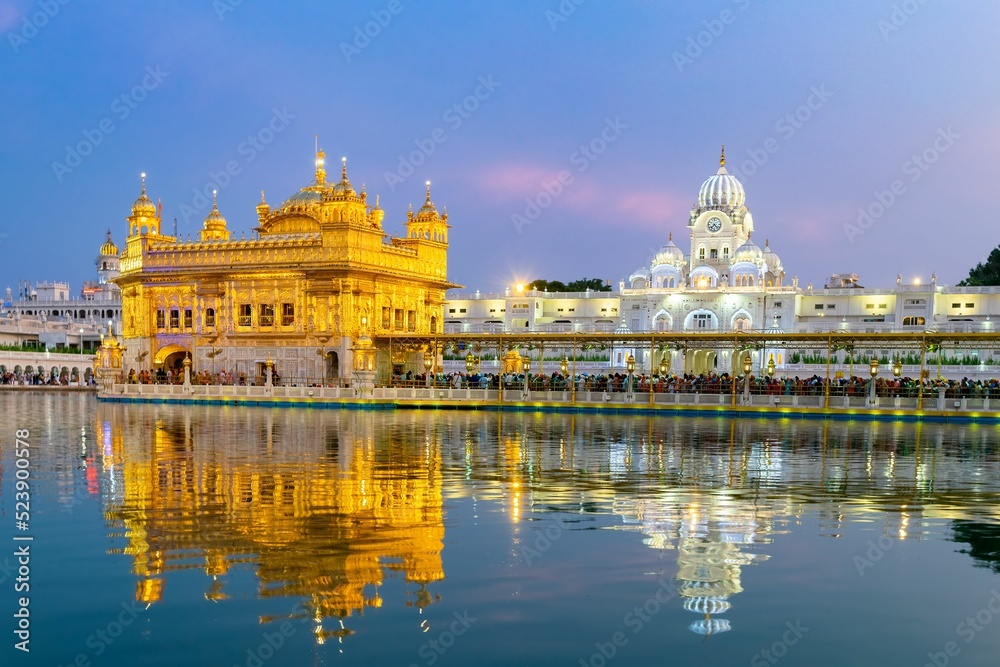 Sri Harmandir Sahib temple in Amritsar, India reflected in the lake ...