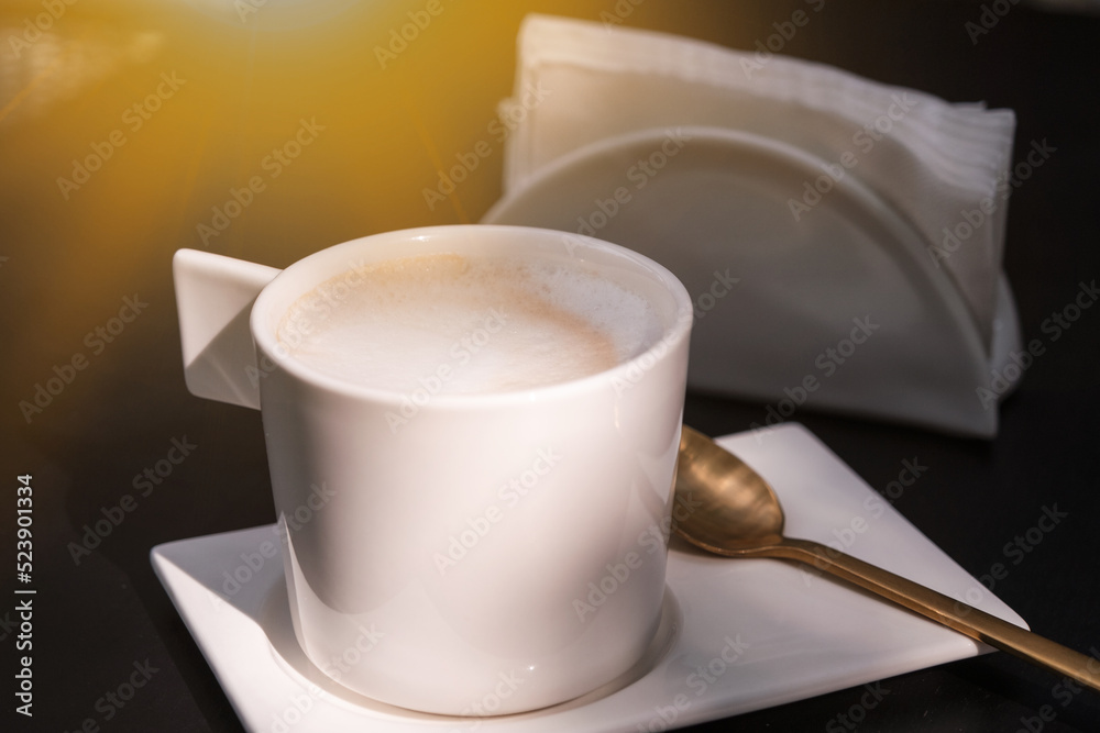 cup of coffee on table in cafe , Morning light cup of coffee on table in cafe , Morning light