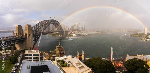 Beautiful, panoramic view of a rainbow over the Sydney Harbour Bridge in Sydney, Australia photo