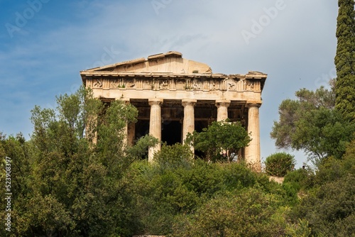 Ancient Agora with trees in front of it in Athens, Greece photo