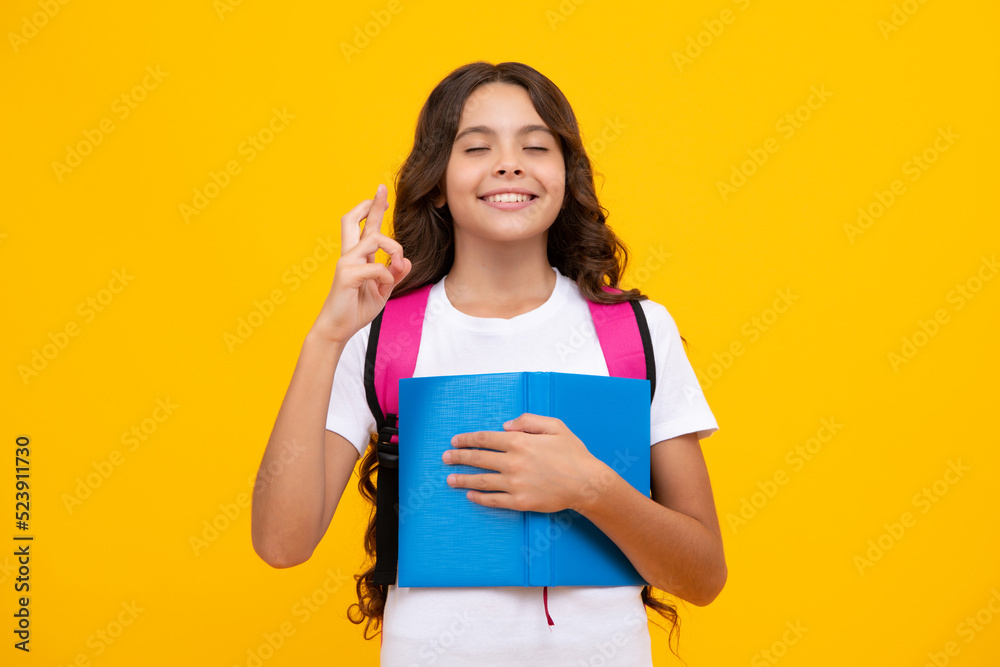 School girl teenager child with book and copybook. Teenager schoolgirl student with backpack, isolated background. Learning and knowledge education concept. School girl teenager child with book and copybook. Teenager schoolgirl student with backpack, isolated background. Learning and knowledge education concept.