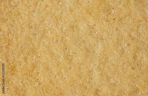 Backed and crispy sugar cookie texture. Top view. Macro shot. Christmas holidays