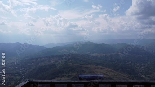 Beautiful view from an open-air balcony to the Gilau mountain range in Romania photo