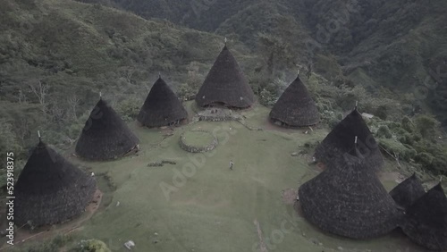 Drone view of Wae Rebo Village with its famous houses in Indonesia photo