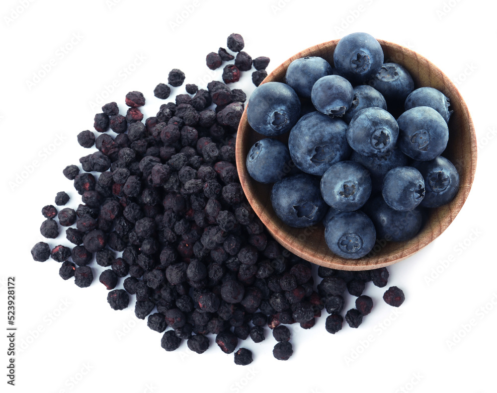 Sweet sublimated and fresh blueberries on white background, top view Sweet sublimated and fresh blueberries on white background, top view