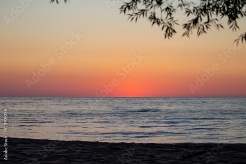sunrise over lake michigan in Wisconsin © Denny