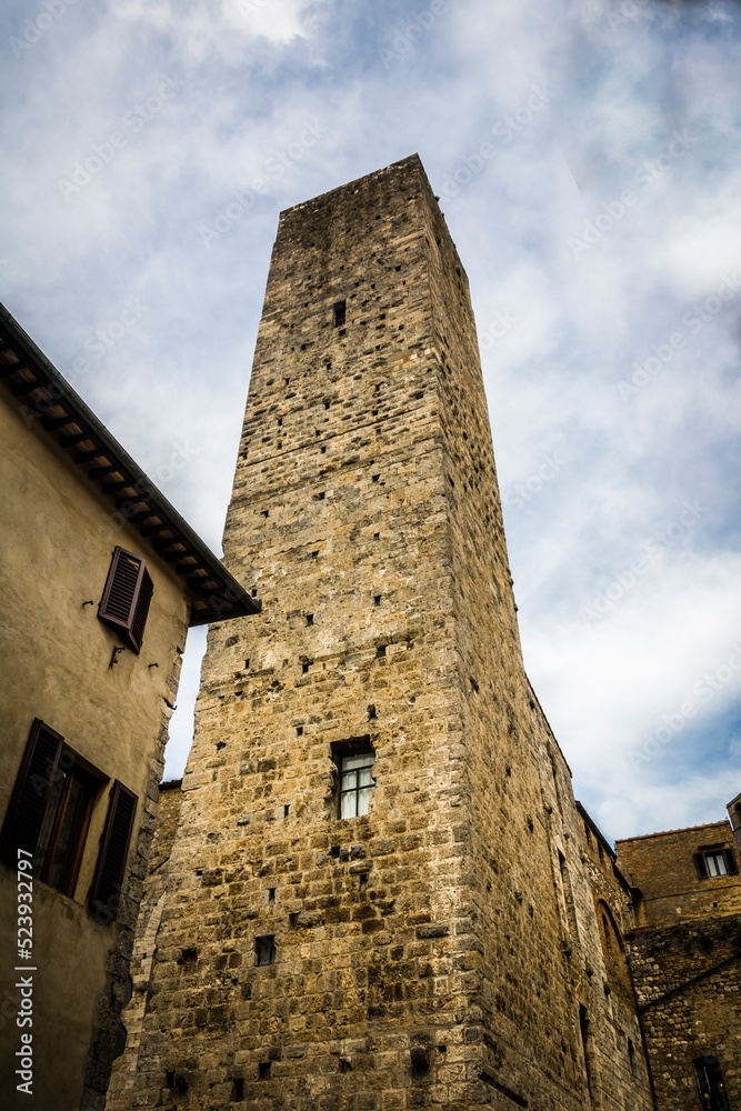 Medieval stone tower against the sky at San Gemignano, Tuscany, Italy.