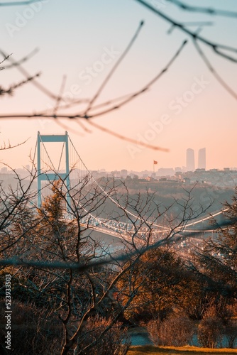Photography Vertical shot of the Bosphorus Bridge at sunset, Istanbul, Turkey