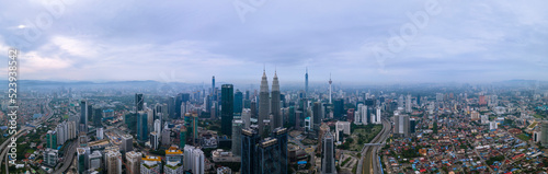 High angle view of sunrise at Kuala Lumpur city skyline with Petronas Twin Towers from Traders Hotel © MuhammadSyafiq