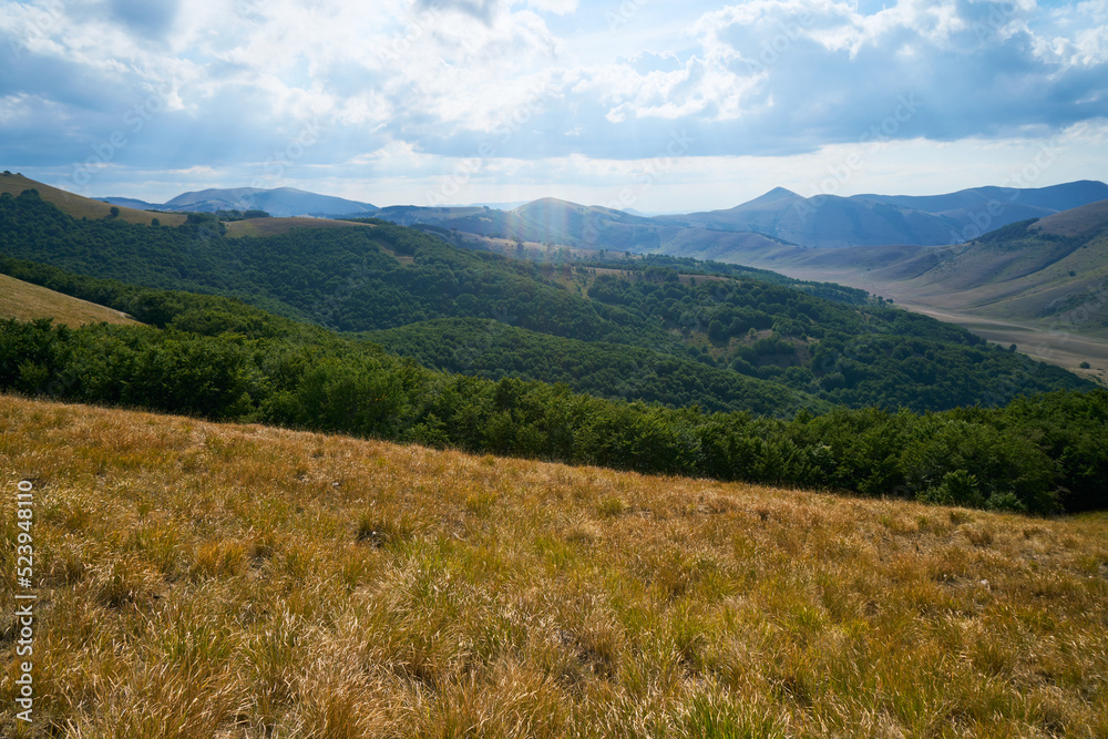 Monti Sibillini national park in the summer from Forca di Presta pathway, Italy