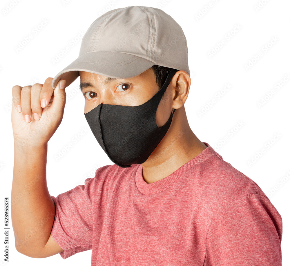 Close up of young male wearing protective face mask on blue background. Close up of young male wearing protective face mask on blue background.