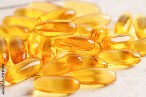 Fish oil or Cod liver oil gel in capsules with omega 3 vitamins, supplementary healthy food