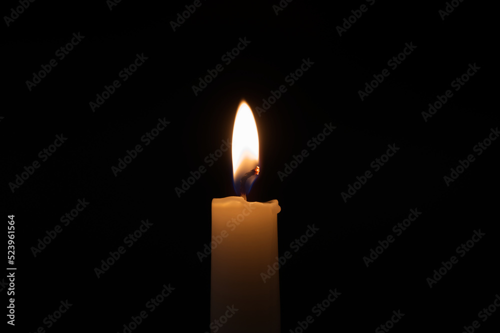 Candle flame against a black background Candle flame against a black background