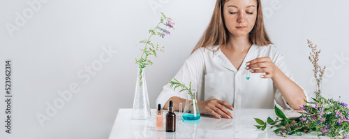 Woman working with cosmetic, scientist ,doctor, make alternative herb medicine with herbal the organic natural in the laboratory. oil capsule, natural organic skincare and cosmetic.
