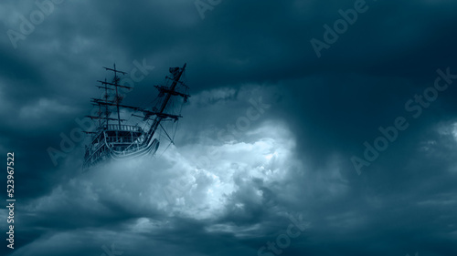 Flying old ship in the stormy clouds 