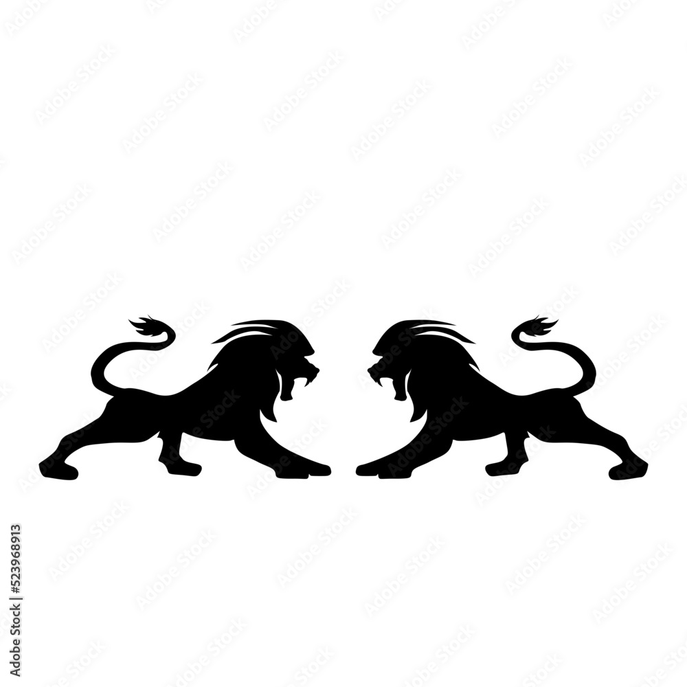 Two lion lions facing each other ready to pounce Two lion lions facing each other ready to pounce